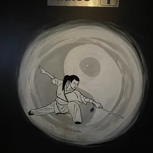 Ladies restroom sign keeping true to the Kung Fu theme.