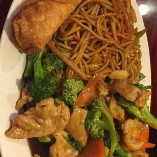 Chicken and Broccoli with Veggie Chow Mein and Egg Roll.