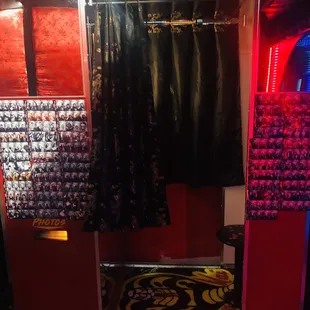 a small room with a toilet and a shower