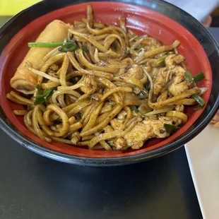 Chicken Lo mein, level 2 spice with spring roll. Delicious!