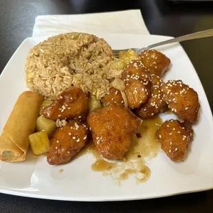 Sesame chicken (pineapple) with fried rice and spring roll! Fantastic!