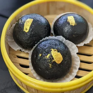 Charcoal egg custard bun