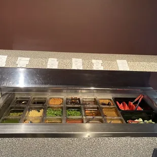 a buffet with a variety of food items