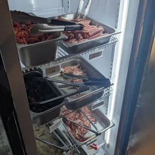 Cooler of meats at Kung Fu Hot Pot, Minneapolis