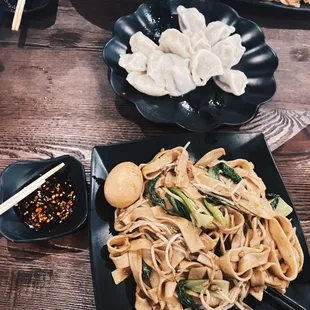 Beef Dumplings and Veggie noodles with an egg on the side. Spicy Level: 3