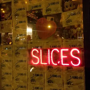 a neon sign in the window