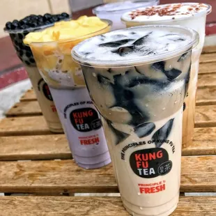 three drinks on a wooden table