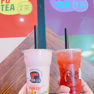Strawberry milk tea with mango popping Boba and Strawberry Lemonade