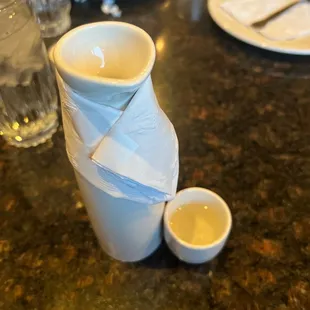 a table with plates and cups