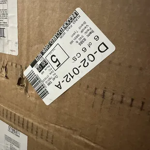 The chicken sitting in the hallway