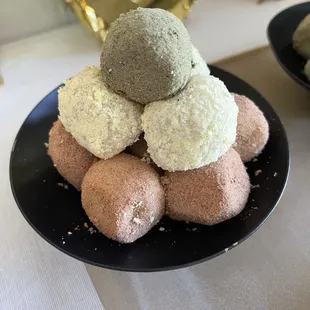 a pile of rice balls on a plate