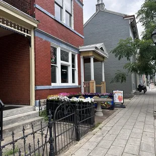 The exterior has nice art and flowers!