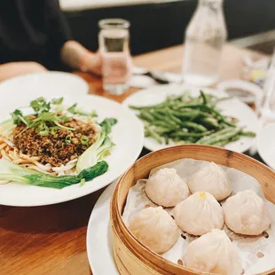 | DAN DAN NOODLES &amp; CRAB + PORK XIAO LONG BAO |