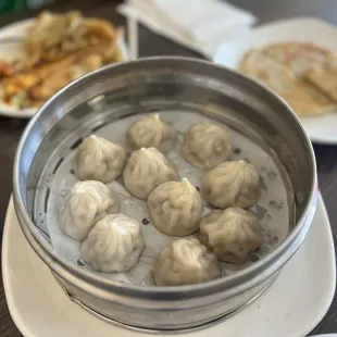 10 Steamed Juicy Pork Dumplings (Xiao long bao)