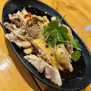 a plate of food on a wooden table