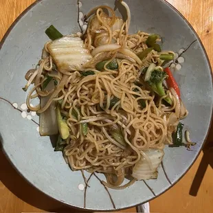 a plate of noodles and vegetables