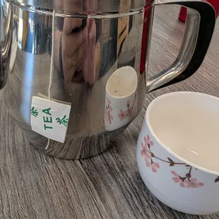 Hot tea while we wait for our order. We ordered the spicy cumin lamb and the BBQ pork buns and the cucumber salad.