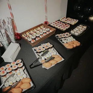 a buffet of sushi and rolls
