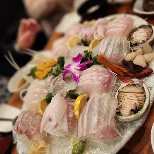 a large platter of sashimi