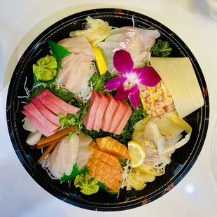 a plate of sashimi