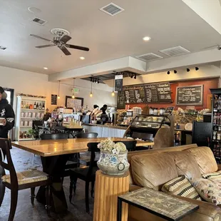 a woman holding a cup of coffee