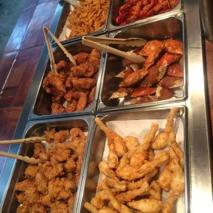 a buffet with a variety of food items