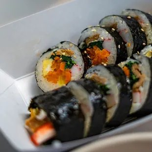 a tray of sushi rolls