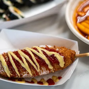 a hot dog with ketchup and mustard