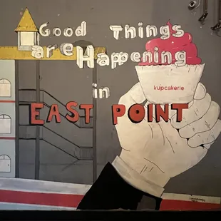 Wall art in the rear room: Good Things are Happening in East Point.