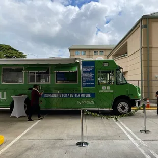 people standing in a parking lot