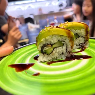a sushi roll on a plate