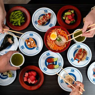 a table full of sushi