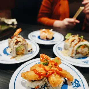 three plates of sushi