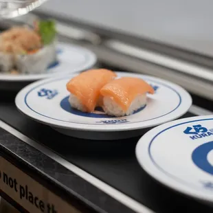 three plates of sushi