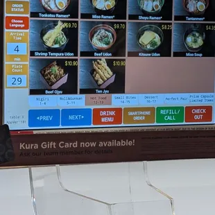 Menu board with plate tissue on it