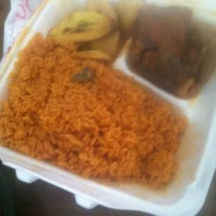 Jollof Rice with Plantains and Goat.