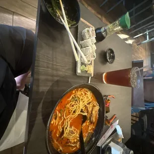 Yellow tail roll and spicy pork ramen.