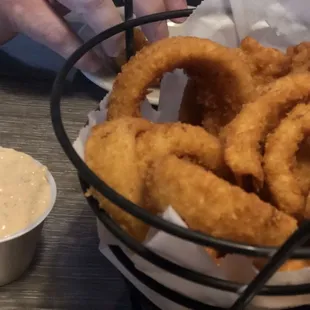 Onion rings with Cajun remoulade sauce.