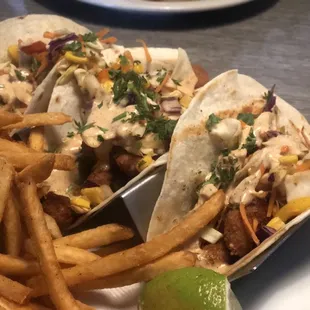 Street Corn tacos topped with roasted corn slaw and house made Street corn sauce