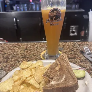 Cold Hacker Pschorr Weisse and  and a shared Reuben  sandwich