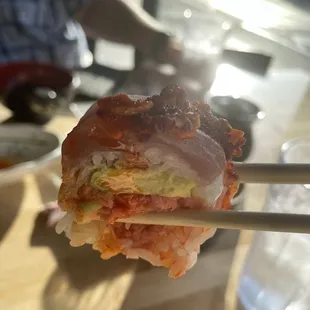 a close up of a piece of sushi