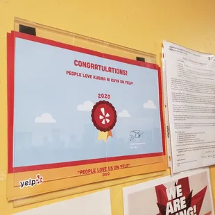 a picture of a poster on a wall