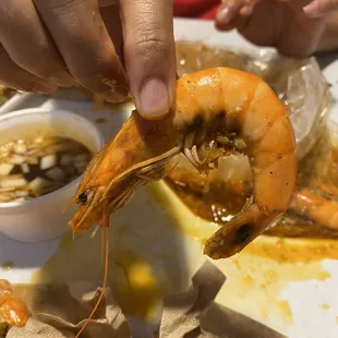 Dark color under means it is old batch or mis handled causing the meat to go bad. I. Our case, it had a bad after taste.