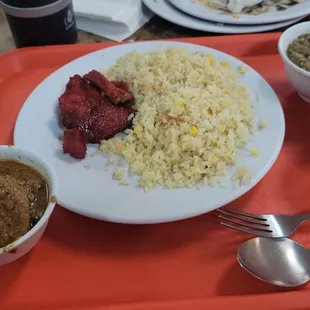 tocino, sinaag on the plate, to the right are monggo,  kare-kare.  left of plate? can't remember...I believe an ilocano dish?