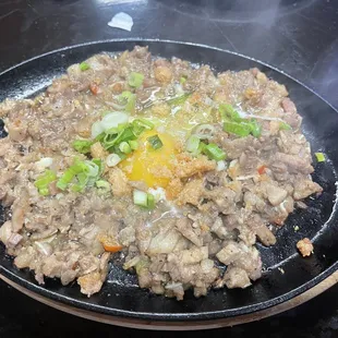 a frying pan of food