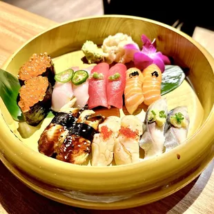 Salmon, yellowtail, tuna, salmon, eel, scallop, mackerel