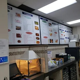menus on the wall of a restaurant