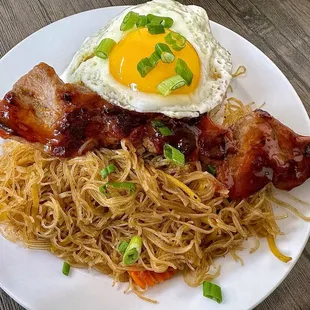 Tocilog plate with garlic rice, sunny side up egg, and pancit noodle