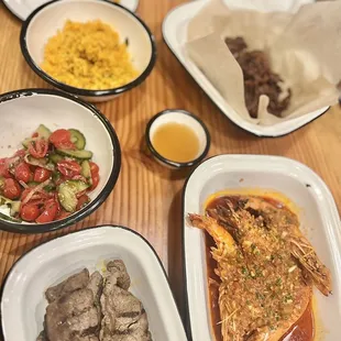 Casual family style. Not big portions. Can feed 1-2 at most.