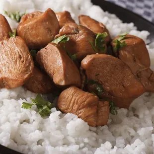 a plate of rice and meat
